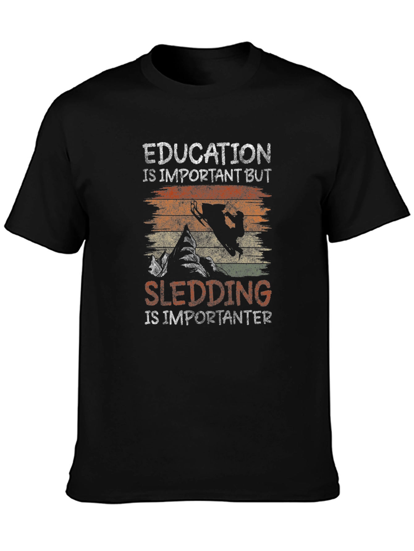 Education Vs Sledding Graphic Tee