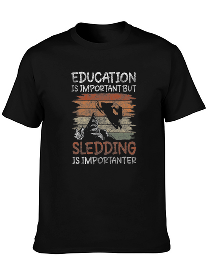 Education Vs Sledding Graphic Tee