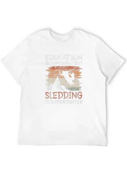 Education Vs Sledding Graphic Tee