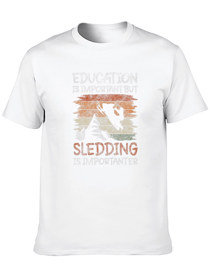 Education Vs Sledding Graphic Tee