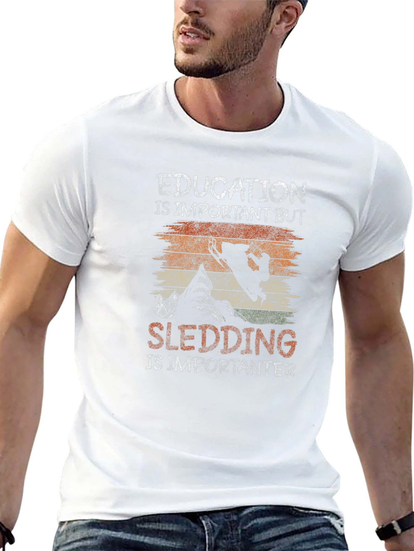Education Vs Sledding Graphic Tee